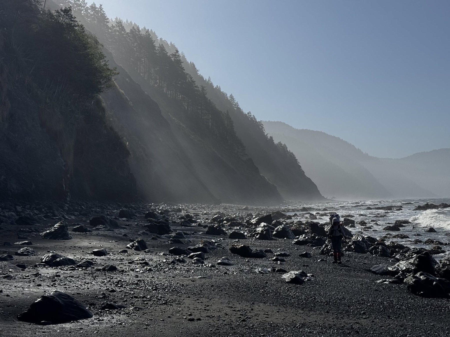 Misty Pacific coastline under low cloud